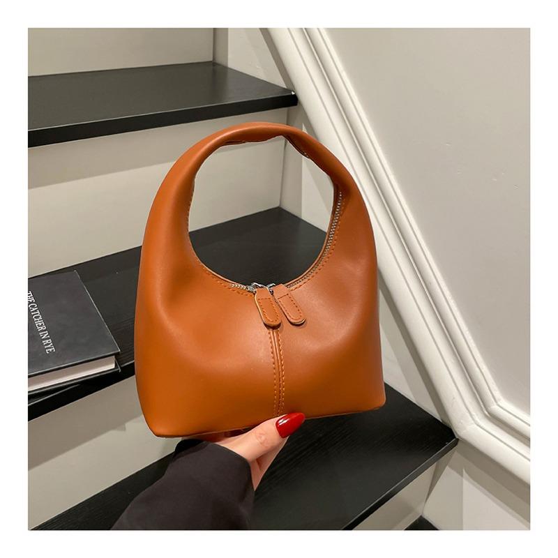 Eine trendige, vielseitige und stilvolle Handtasche, die sowohl modisch als auch schlicht ist