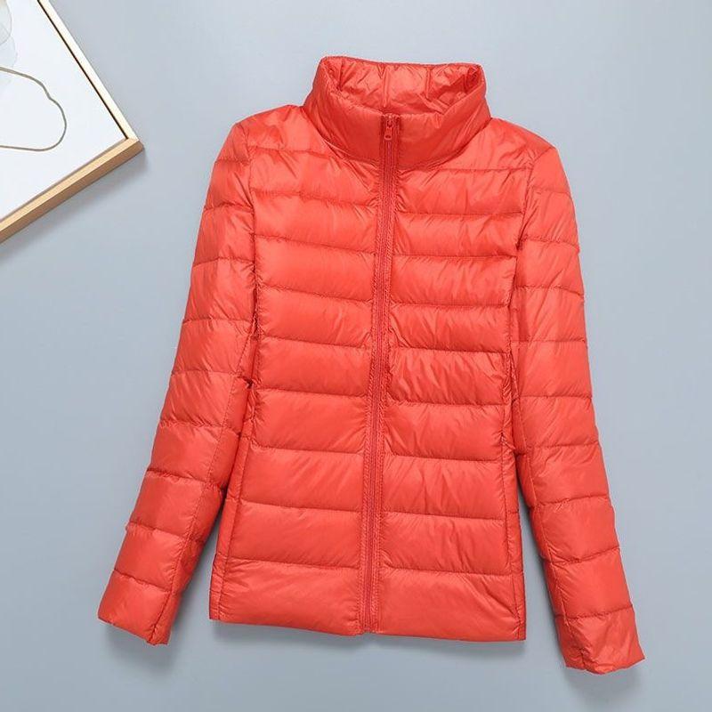 Light down jacket women's short stand-up collar hooded fashion autumn and winter thin large size women's clothing slim-fitting portable jacket