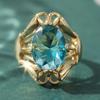 Retro Luxury Hollowed-out Artificial Gemstone Ring Made of Copper, a Ladies' Jewelry Ring Suitable for Formal Occasions