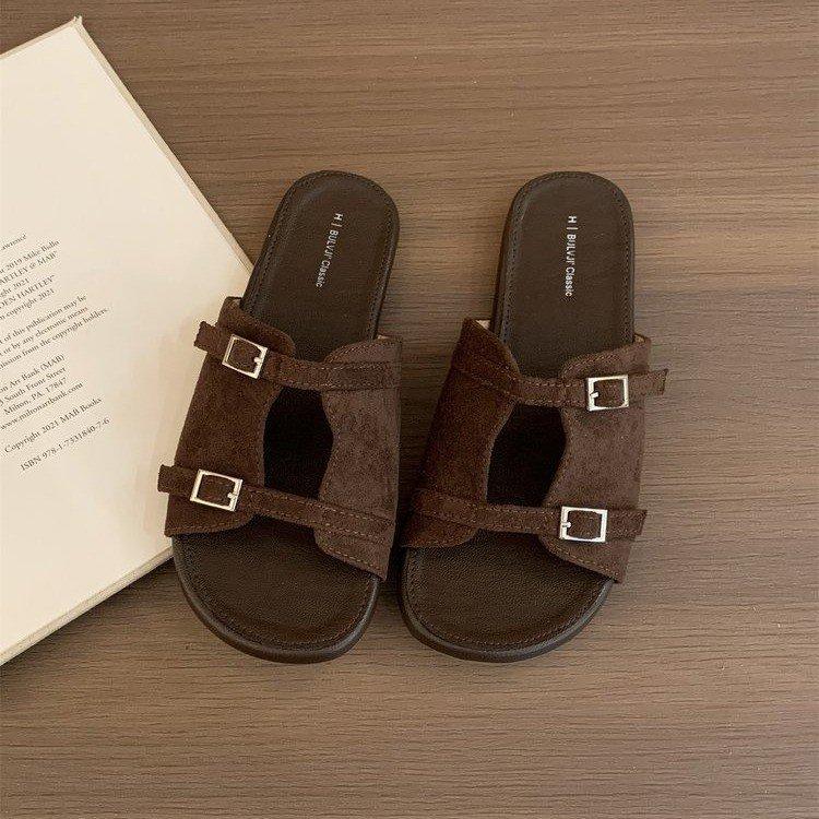 

French one-pedal slippers women s 2025 new summer outer wear flat-bottomed one-word slippers double-buckle beach cool slippers women 40