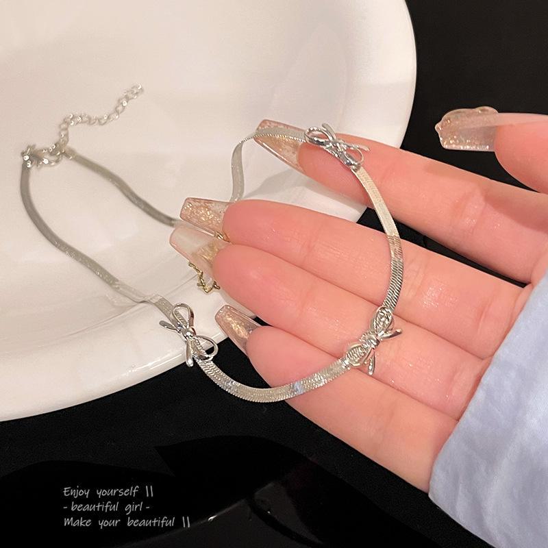 

Минималистичное серебряное ожерелье из змеиной кости с бантом X1406 серебряный