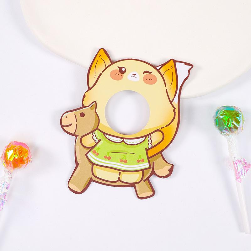 

Открытка-украшение в виде леденца на палочке для упаковки подарков ко Дню защиты детей