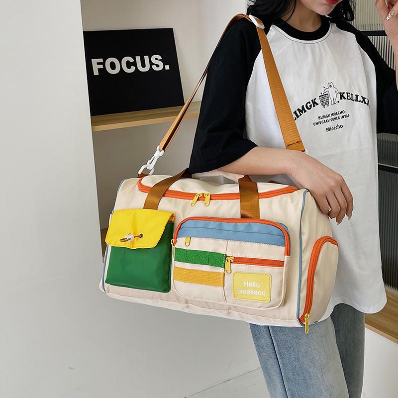 Contrasting color leisure sports fitness bag women's large-capacity portable messenger luggage bag light and short-distance business travel bag men
