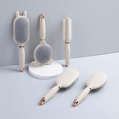 Peigne mignon Anti-statique d'échappement coussin d'air peigne maison femmes cheveux longs friser moelleux airbag peigne tête Massage peigne
