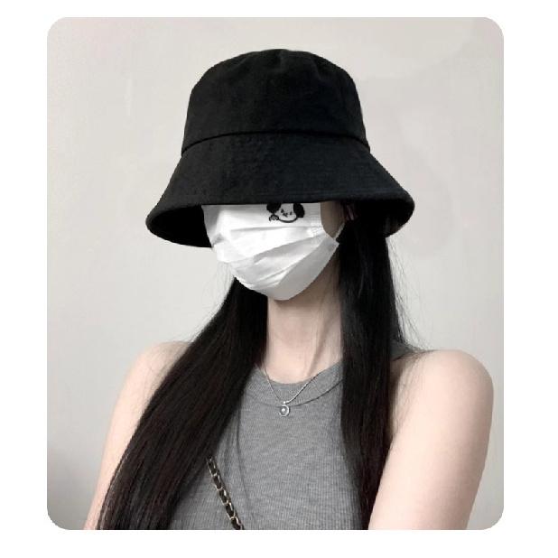 Black fisherman hat for women, oversized design, stylish and sun-protective, bucket hat