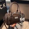 2025 new Korean version fashion simple commuter gloves bowling bag commuter versatile niche trend messenger women's bag