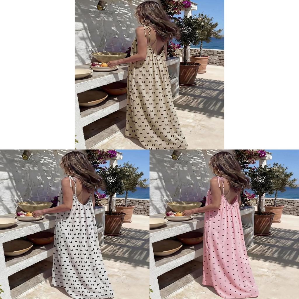 Abito estivo da donna con stampa a pois e gonna lunga svolazzante per la spiaggia e l'uso casual