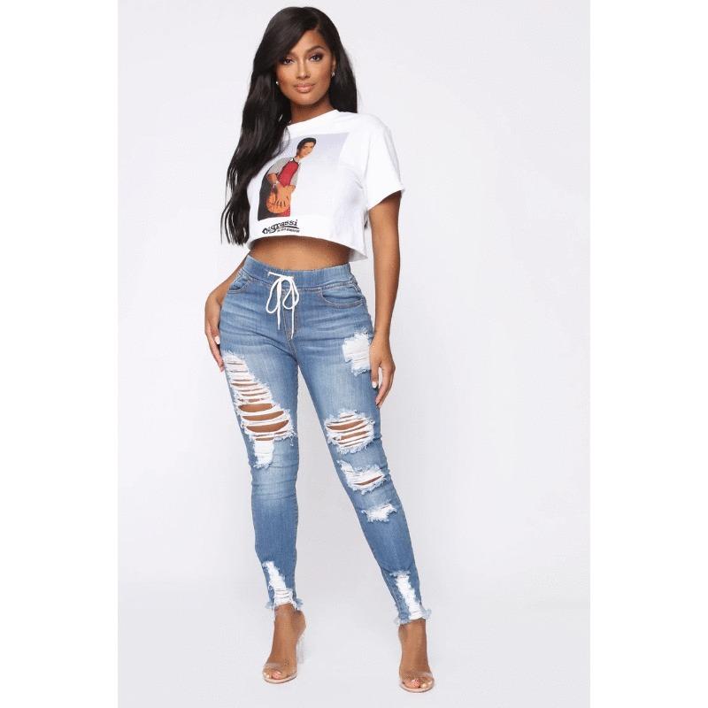 Jeans skinny con elastico in vita, vita media, strappati, allacciati in pizzo per donna
