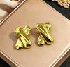 Stainless steel high-end gold earrings, niche design light luxury metal studs, temperament earrings