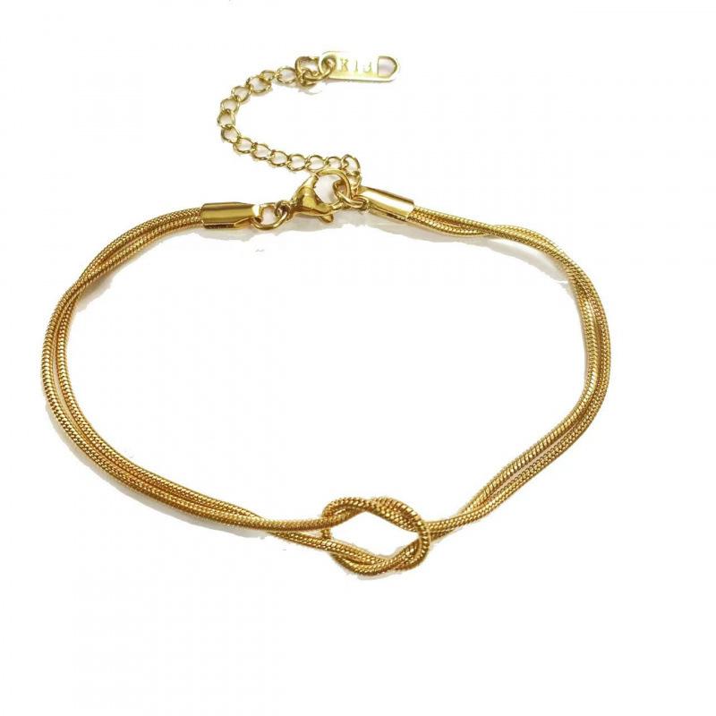 Along Island There Is A Simple Double-layer Knotted Snake Bone Chain That Both Luxurious Versatile Couples. It Comes With Plain Bracelet