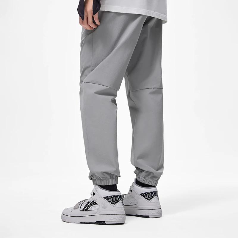 Li Ning Plain Lace-Up Casual Sports Pants Men bottoms Gray AYKT199-4