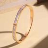 Rose Gold Titanium Steel Bracelet for Women - Non-fading, Stainless, with Three Diamonds, Simple & Fashionable Design.