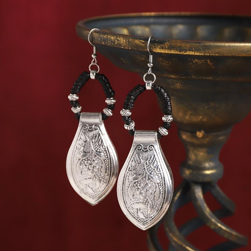 Woven earrings exaggerated Miao silver engraved earrings exotic retro style horse dress long earrings
