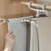Multifunkční skládací věšák na kalhoty: Nezanechávající stopy, protiskluzové ramínko šetřící místo pro organizaci šatníku.