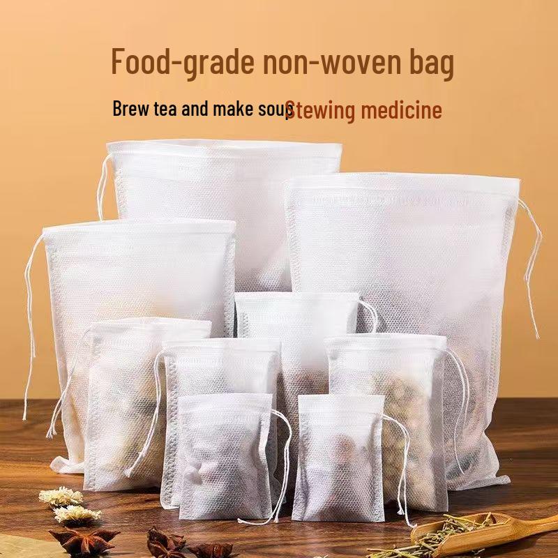 100-Piece Disposable Tea Bags: Food-Grade Non-Woven Drawstring Bags for Chinese Medicine Decoctions and Dregs Separation.