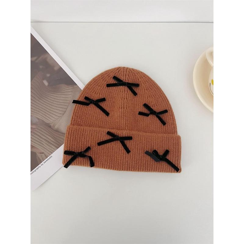

Шерстяная шапка Холодная шапка для женщин Осень и Зима Корейская версия Однотонная с бантом Вязаная Милая Защита ушей Лицо Маленькая шапка с отворотом Модная one size