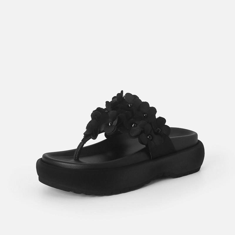 Sheepskin Zhao Zhaoyi has the same thick-soled slippers, women's summer flip-flops, and women's shoes wear French flip-flops.