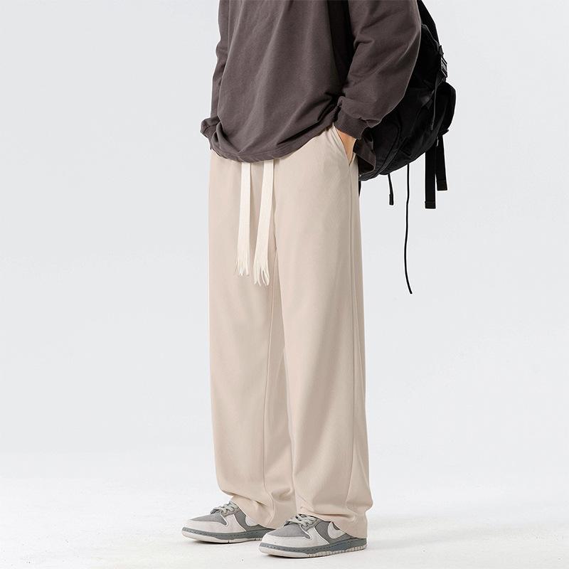 

Мужские весенне-осенние новые парные однотонные повседневные брюки с широкими штанинами, драпирующиеся спортивные универсальные защитные брюки для мужчин 4XL