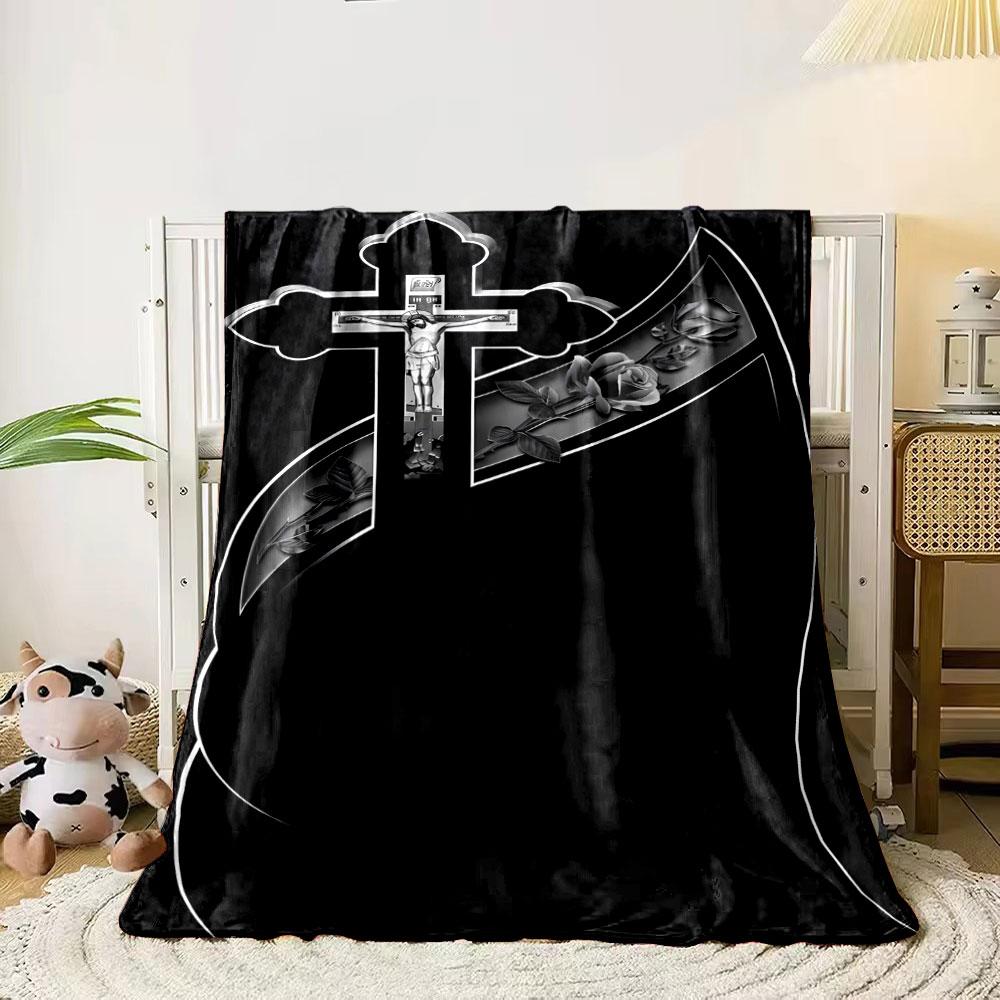 

A crucifix with floral motifs and flowing ornate design on a black background. for all seasons blanket lunch break throw gift 80cm x 120cm