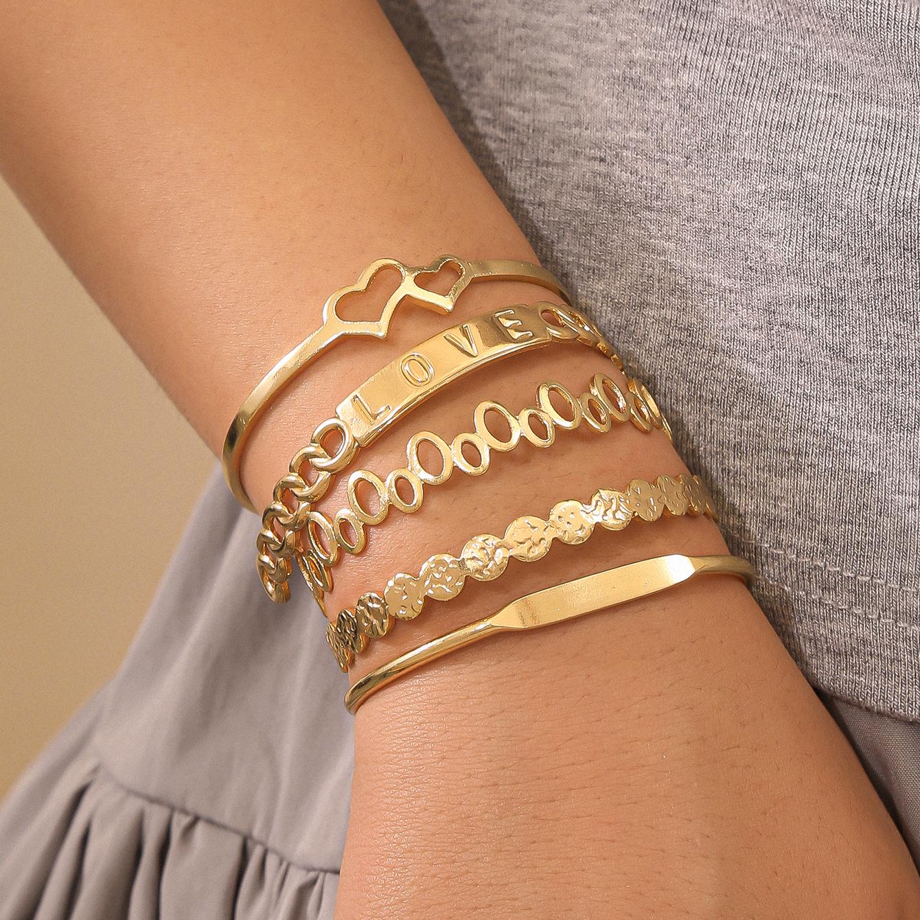 

Европейская и американская мода Геометрический многослойный витой набор браслетов - 10 штук Alloy