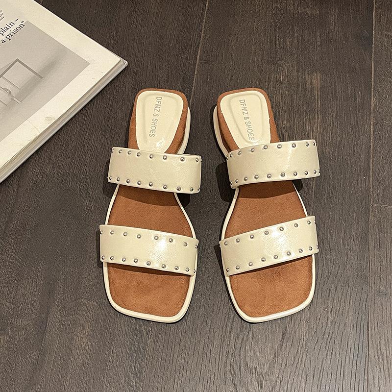 

Foreign trade 2025 summer new one-word slippers roman sexy rivet flat heel fashion beach cool slippers women 40