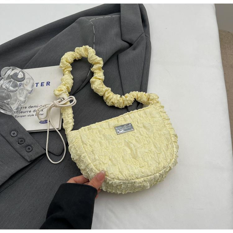 

2025 Spring New Pleated Cloud Bag Women s French Niche One Shoulder Armpit Bag Personalized Foreign Versatile Crossbody Bag жовтий