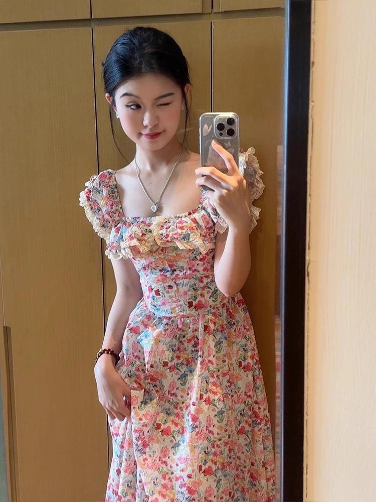 Seaside vacation temperament dress summer French gentle and chic small flying sleeves floral fairy long dress waist and thin