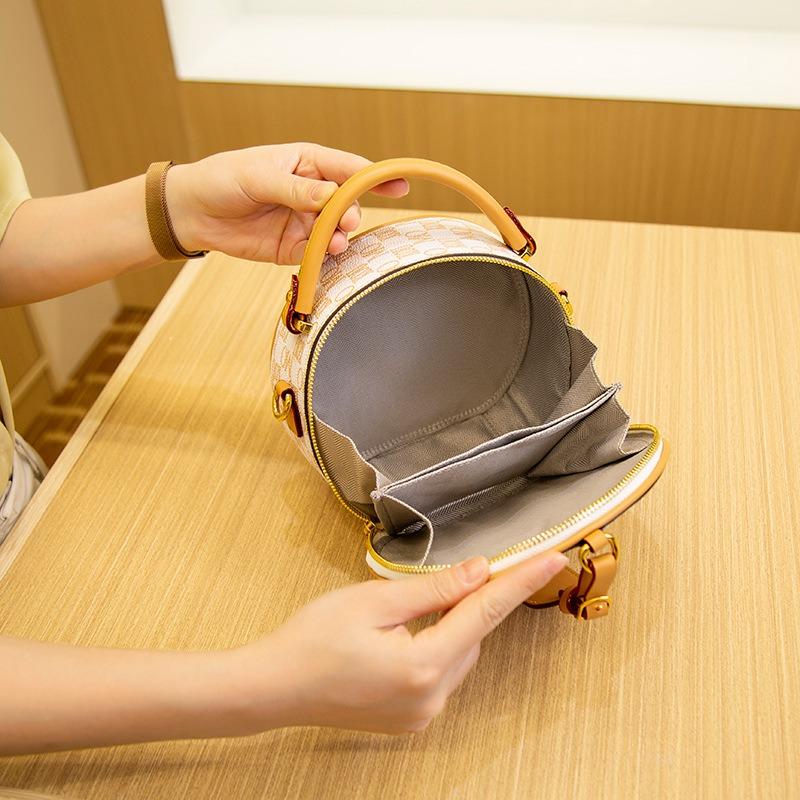 Retro New Women's Bag, Letter-printed Portable Small Round Bag, High-end Contrasting Color Round Cake Bag, Shoulder Messenger Bag.