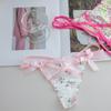 Damen Sommer Sexy Pure Lust Gebrochene Blume Armbrust Tanga-Linie Unterwäsche