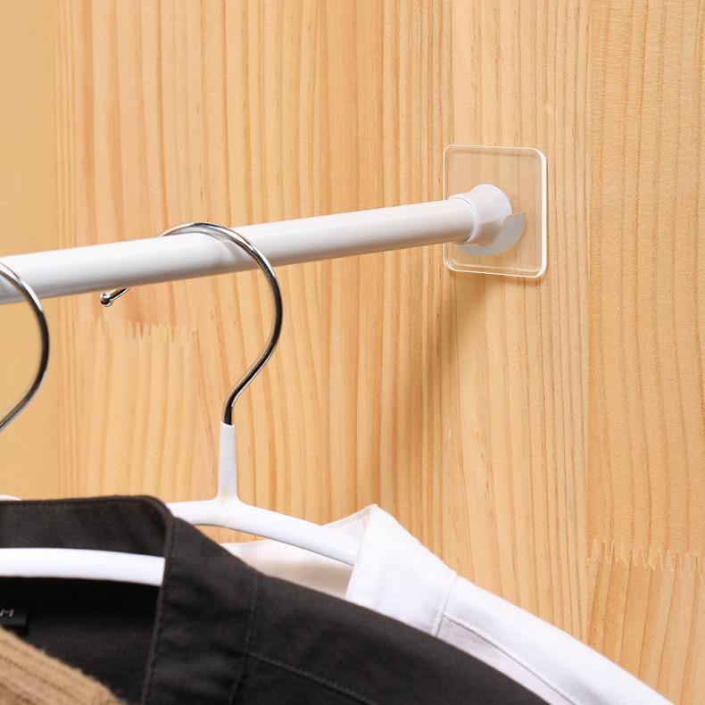 Nastavitelný samolepicí držák záclonové tyče a držák na sušení prádla