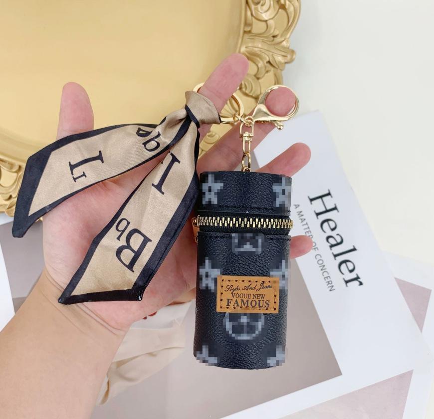 Old flower change bag new small bag pendant earphone bag mouth red envelope mini keychain bag