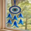 @ Evil Eye Wall Hanging with Blue Feather