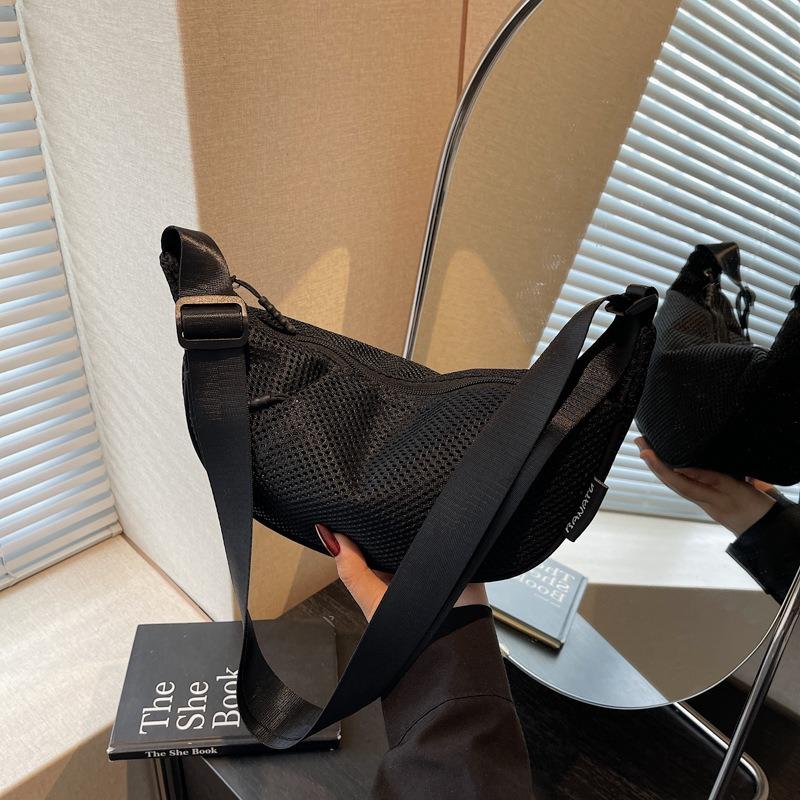 

Summer women s high-end niche dumpling bag breathable woven messenger bag versatile hollow bag чорний