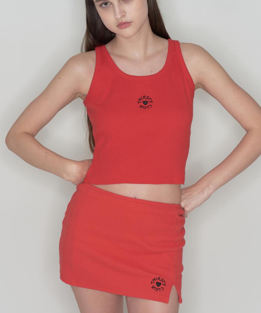 Tteolseutikeulleob Round Logo Slit Skirt Pants - Red
