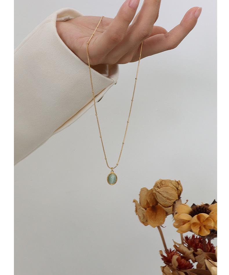 French Retro Clavicle Chain Necklace: 18k Gold-Plated Titanium Steel with Cat's Eye Oval Pendant for Women