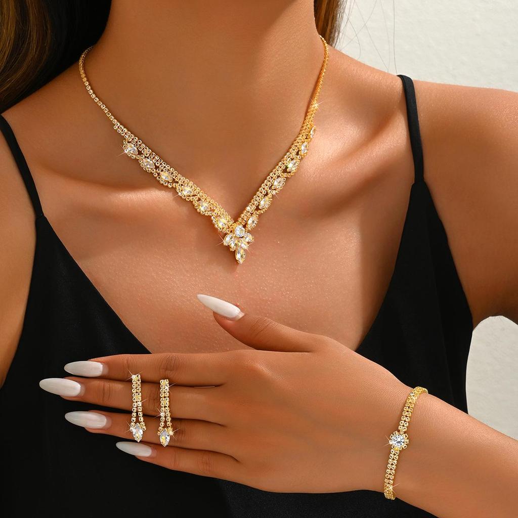 Gold Bridal Jewelry Set: Elegant Necklace, Earrings, and Bracelet for Weddings & Special Occasions.