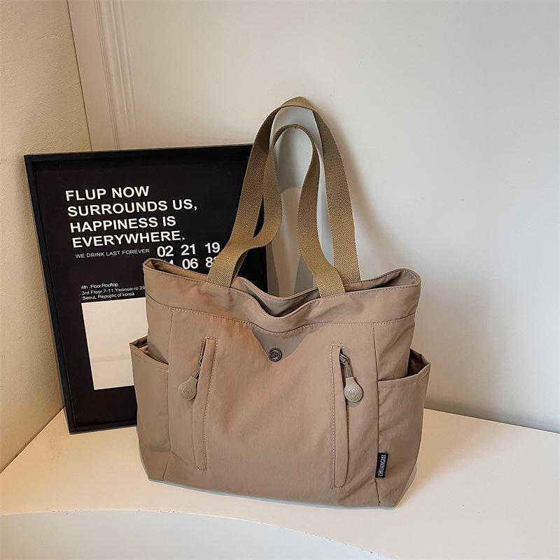 Large-capacity solid color women's bag winter new simple outdoor bag commuter high-value shoulder bag