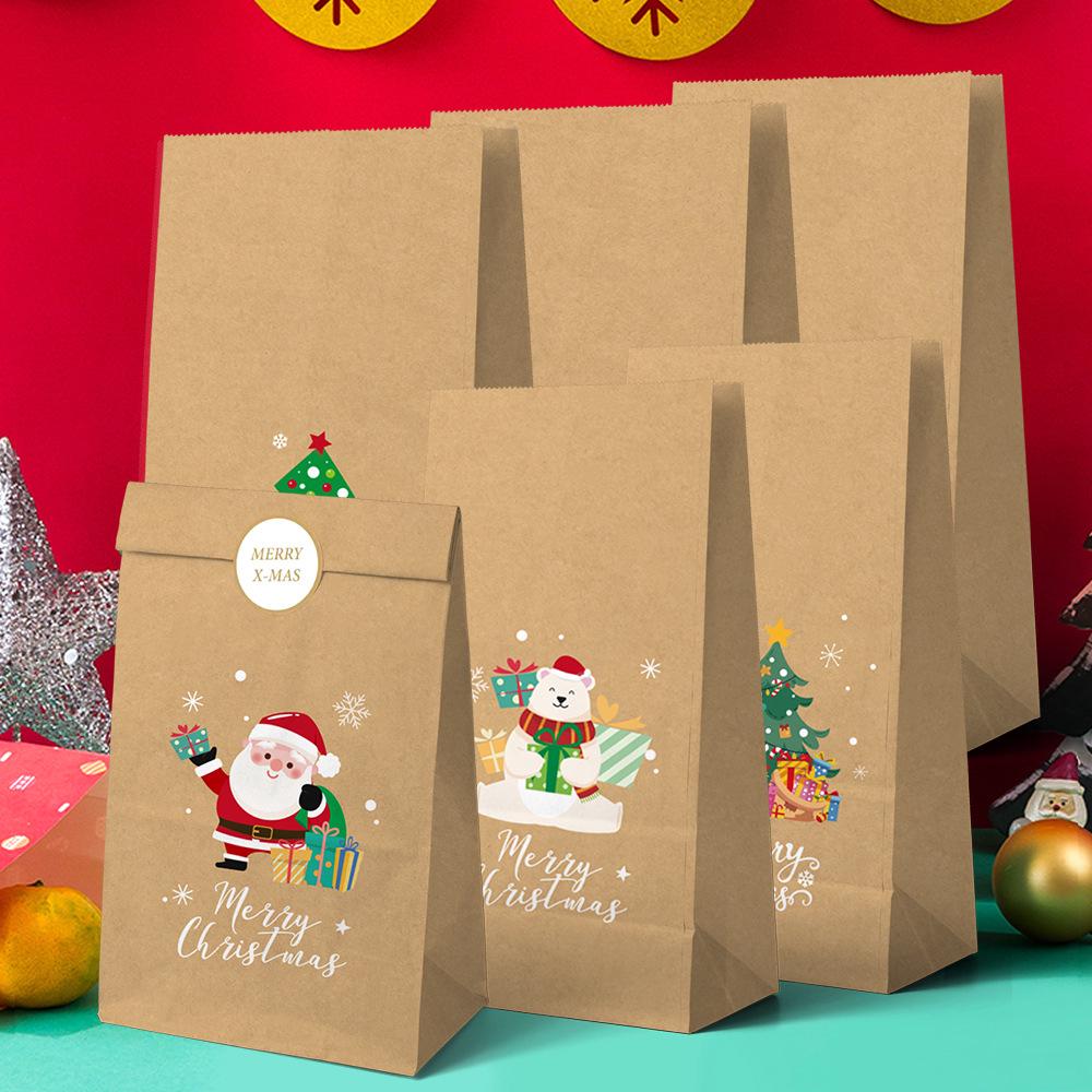 Kraftové papírové vánoční dárkové tašky s designem Merry Christmas a samolepkami na cukroví a pečené zboží