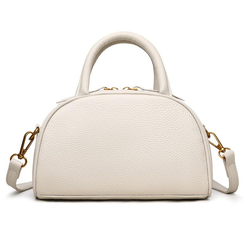 

The new hand-held shell bag is a fashionable pebbled pattern light luxury texture shoulder bag with a simple temperament and a popular crossbody bag