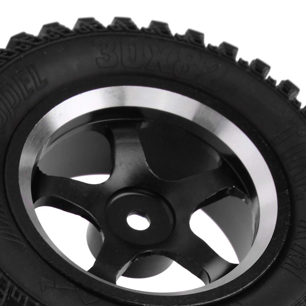 Set aus 4 schwarzen Aluminium-Radnaben mit Gummireifen für 1:12 MN86 Auto Rote RC-Autoteile, Ersatzräder