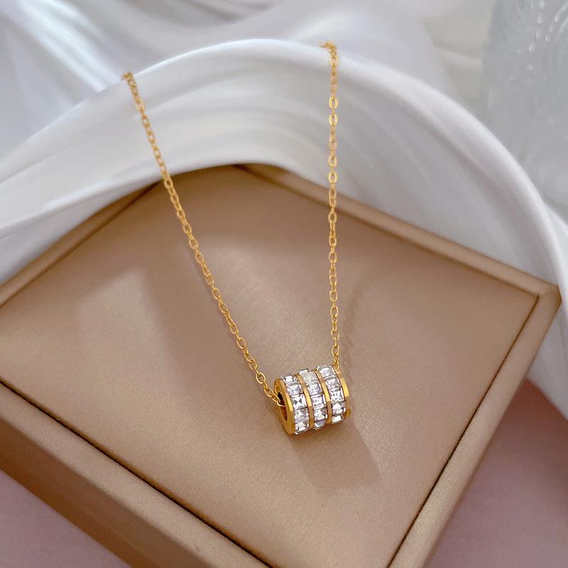 

Минималистичное ожерелье из титановой стали и золота - женская цепочка на ключицу