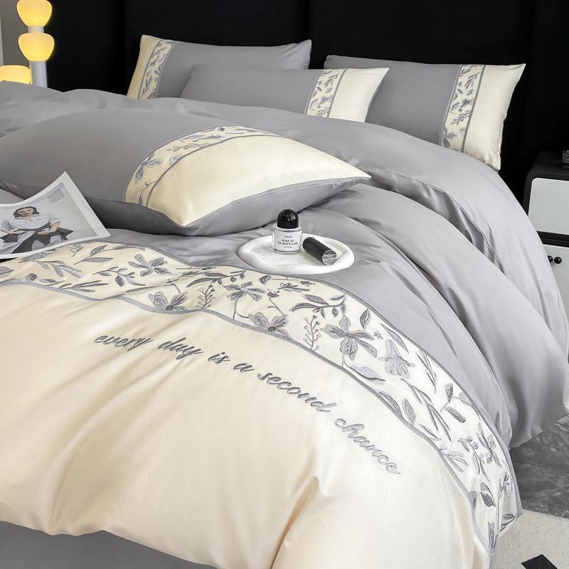 Light Luxury 100% Long-Staple Cotton Embroidered Bedding Set - High-End Four-Piece Pure Cotton for All Seasons.