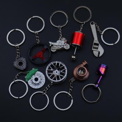 Chiave a cricchetto e portachiavi a pistone: Regalo Modifica Mozzo Ruota Auto e Moto