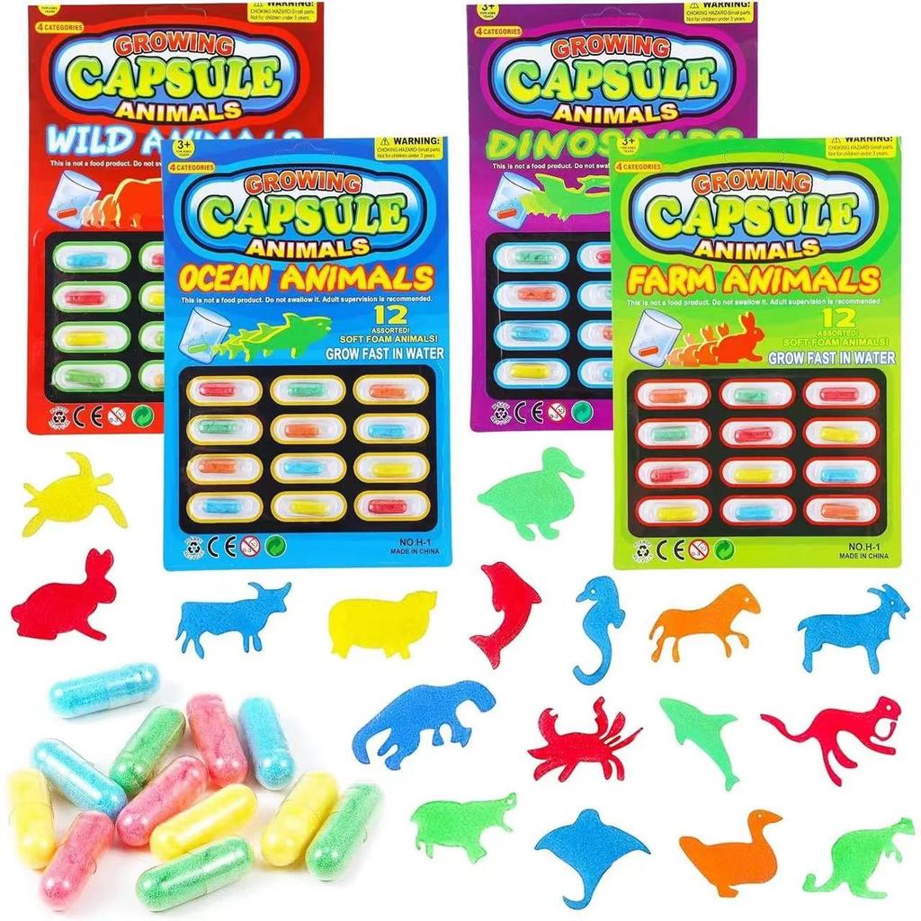 In Wasser einlegen Kapseln Zeichentricktiere lustige Spielzeuge, die in Wasser größer werden Kapseln Magie Kinderbad Interaktion Spielen