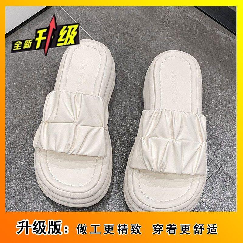 One-word drag women's high-end sense of explosion outside 2024 summer new stepping on shit muffin fashion heightening thick-soled slippers