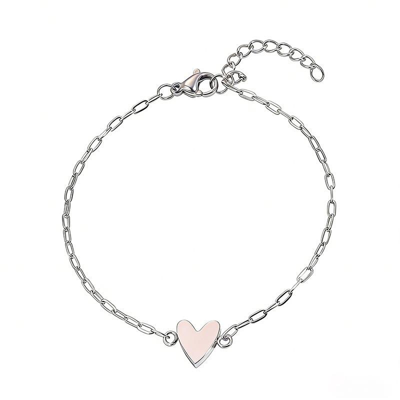 Simple and non-fading titanium steel hollow pull love couple advanced sense two-piece set casual versatile