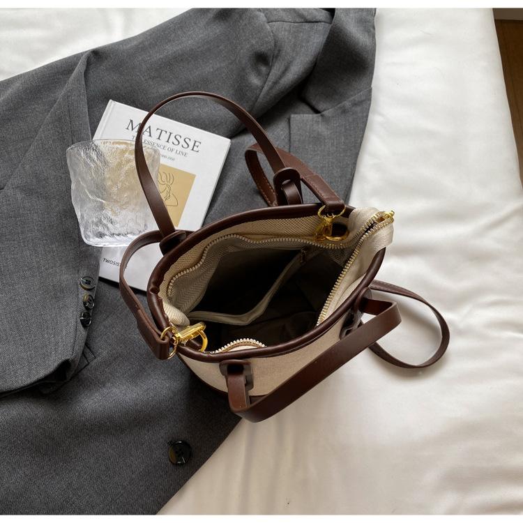 1 szt. 2025 Wybuchowa kontrastowa torba typu wiadro damska uniwersalna torba na ramię do pracy w mieście prosta torba premium wiatrówka