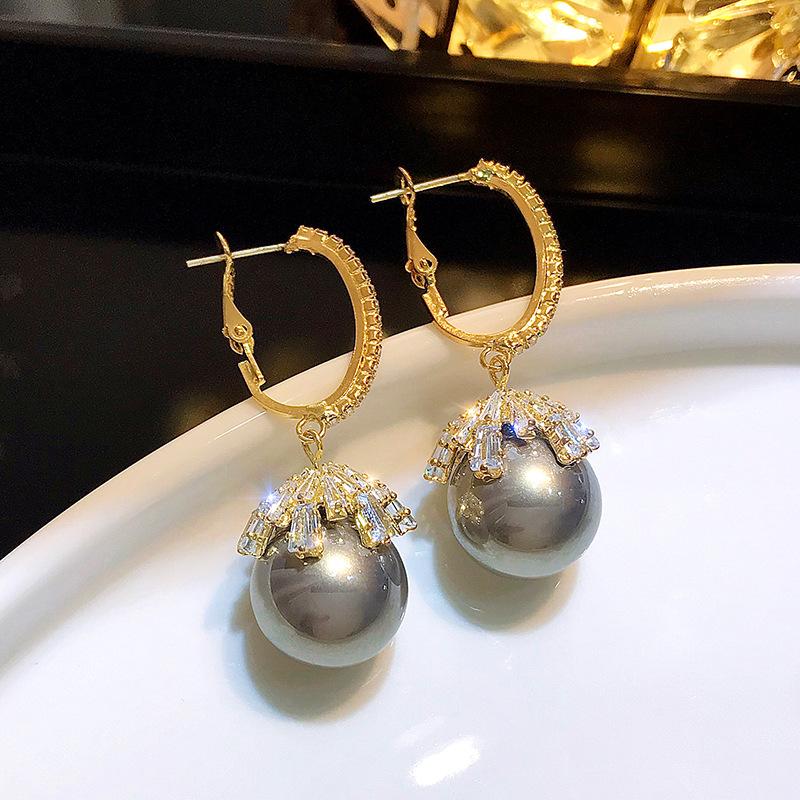 Micro-set zircon pearl earrings, women s tide stud earrings, temperament fashion earrings.
