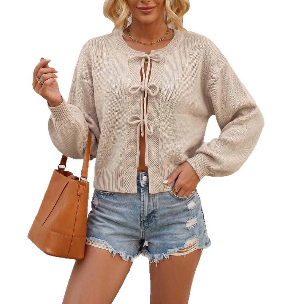 2026 solid color autumn and winter European and American style lace-up bow jacket sweater women's round neck commuting cross-border knitted cardigan