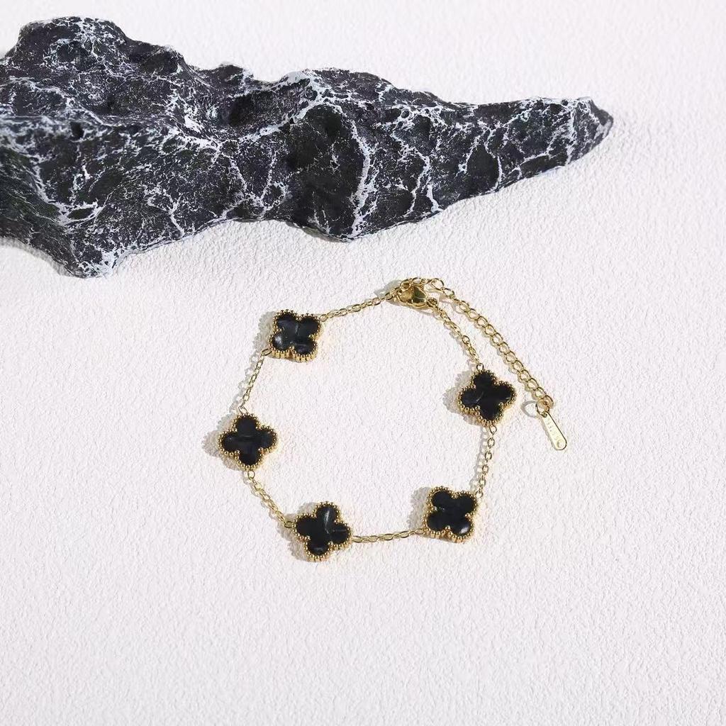 Elegant Titanium Steel Four-Leaf Clover Bracelet with Five-Petal Design